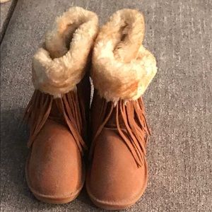 Above the ankle camel colored boots with tan fur